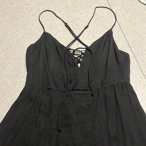 Reformation sundress with adjustable straps. Comes with original tote